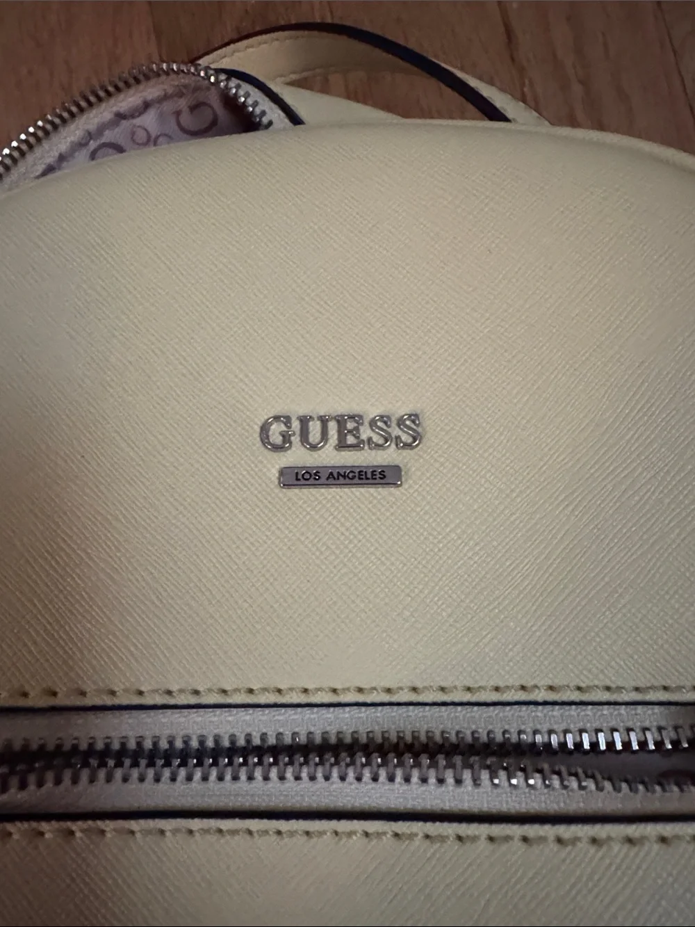 GUESS Pale Yellow Mini Backpack with Silver Hardware